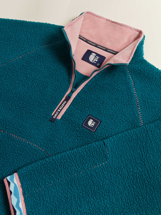 Retro Pattern Woven Tape Details around the cuffs and the hem of the sherpa fleece.