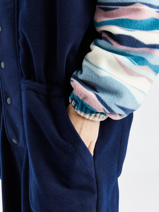 Harper & Lewis branded tab on the cuff of the womens fleece boilersuit.