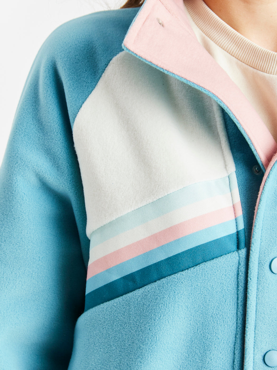 Stripe details on the chest of the boilersuit giving this fleece all in one a vintage look.