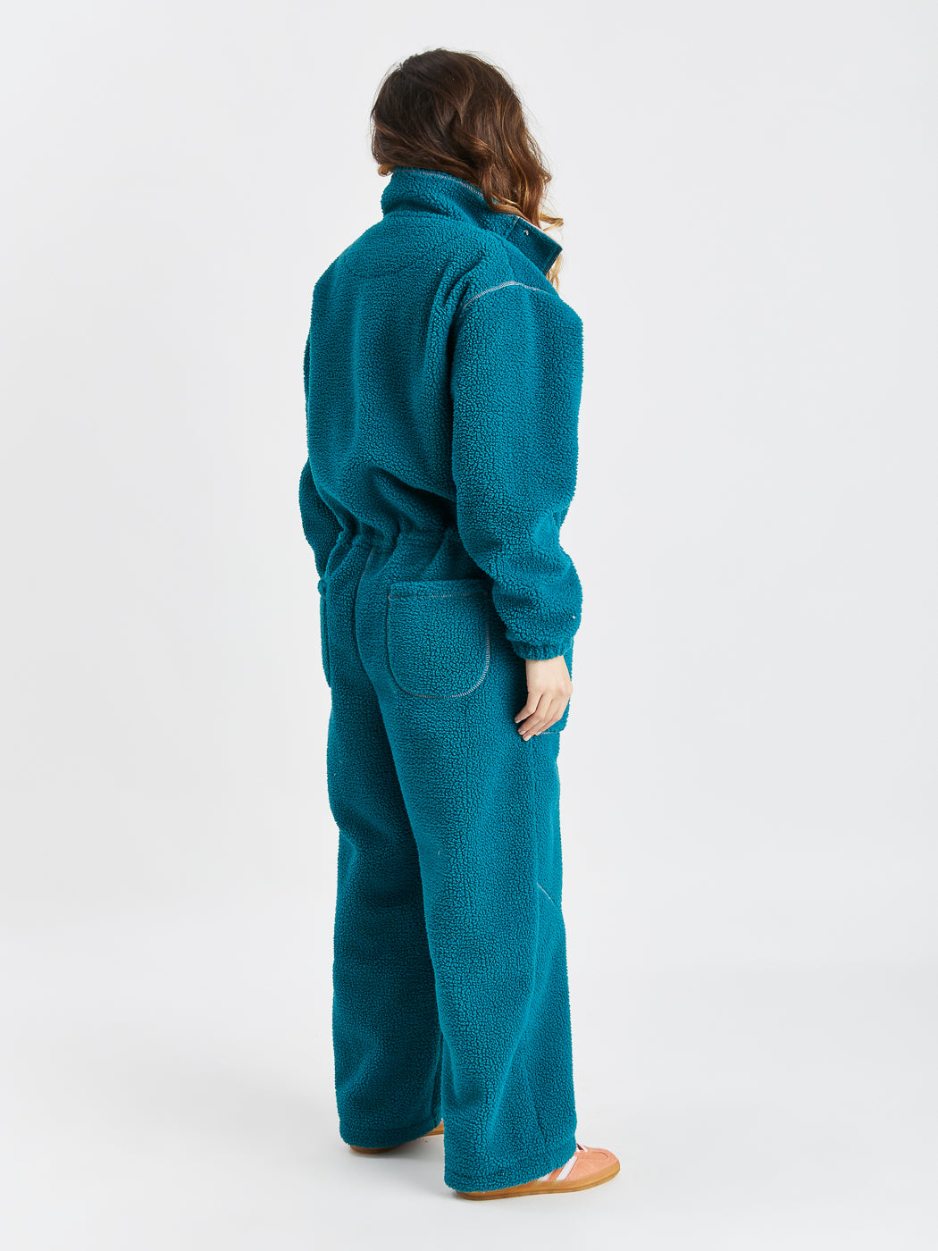 Two back pockets on the Sherpa fleece adds to the boilersuit style.