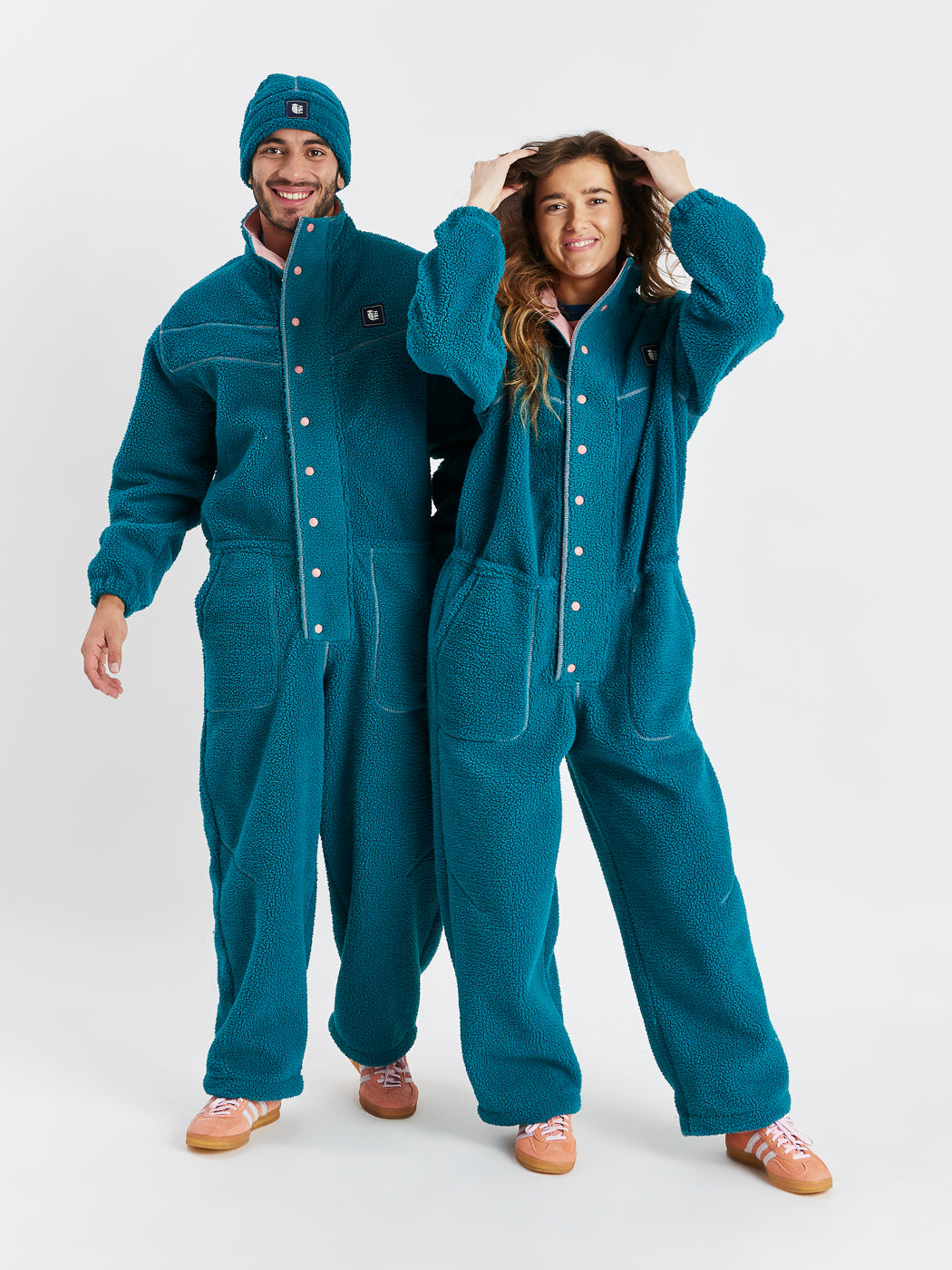 Add a bold and cosy statement piece to your wardrobe with the Reese Teal Green Sherpa Boilersuit.