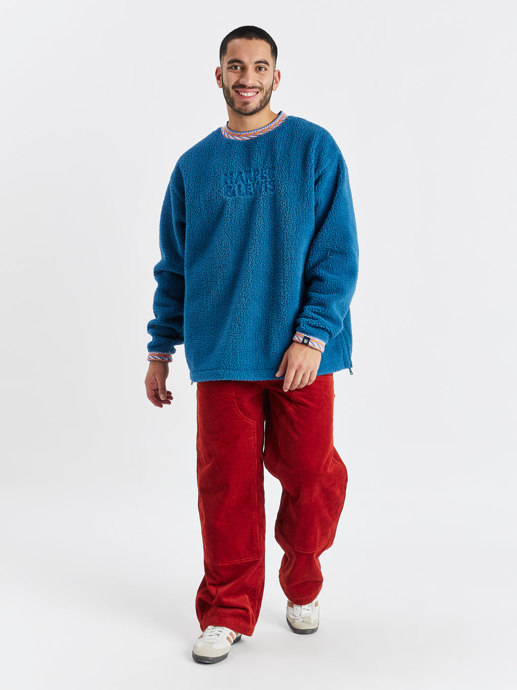 Brushed on both sides this piece stands out with its distinctive details this Sherpa sweater will keep you warm all of the time.