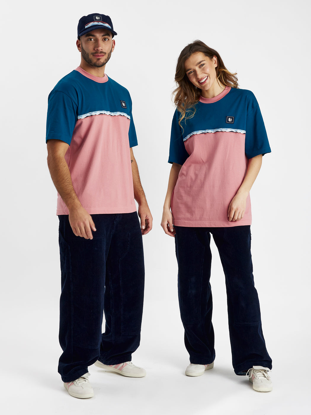 Unisex T-shirt styled by both a man and women, showing that anyone can wear.