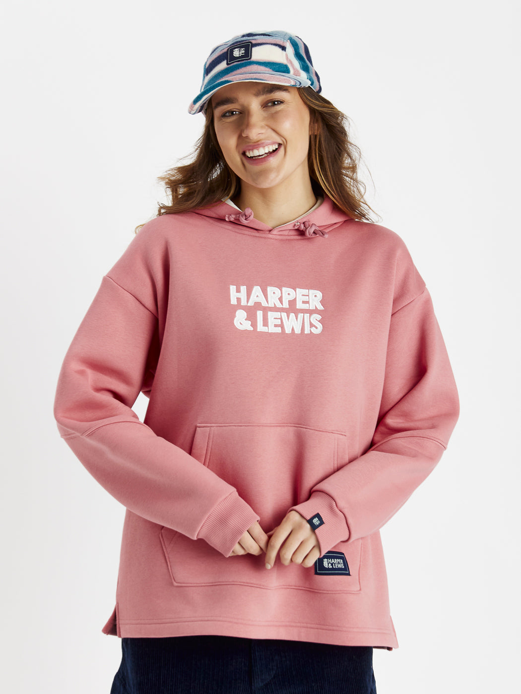 Womens hooded sweatshirt features an oversized fit and drop shoulders for a more flowy look.