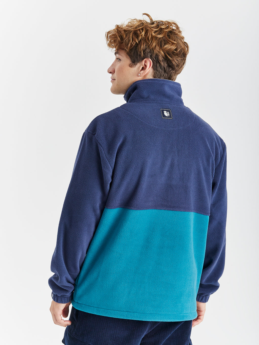 This colour block fleece is for the winter days and chilly evenings, with it's high neck feature.