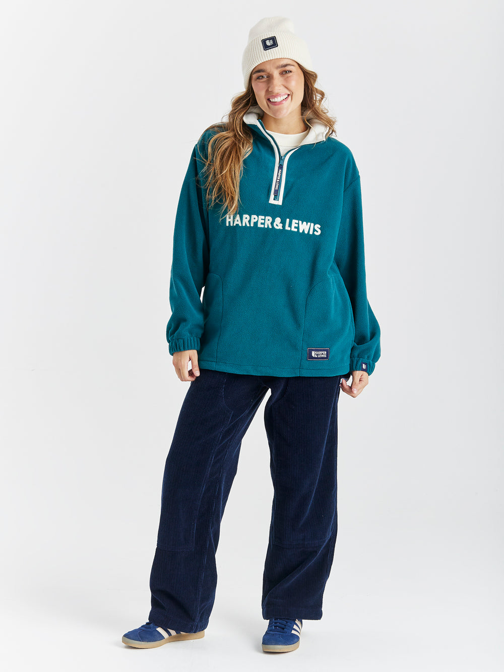 Oversized Quarter Zip Retro Fleece with two side pockets and a drawcord hem.
