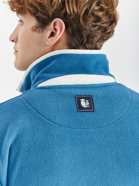 Oversized Quarter Zip Retro Fleece with two side pockets and a drawcord hem.