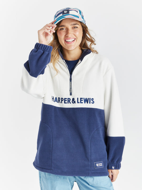 Harper & Lewis Berkley 1/4 Zip Fleece, features a half and half design with the top being Cream and the bottom half being Navy.
