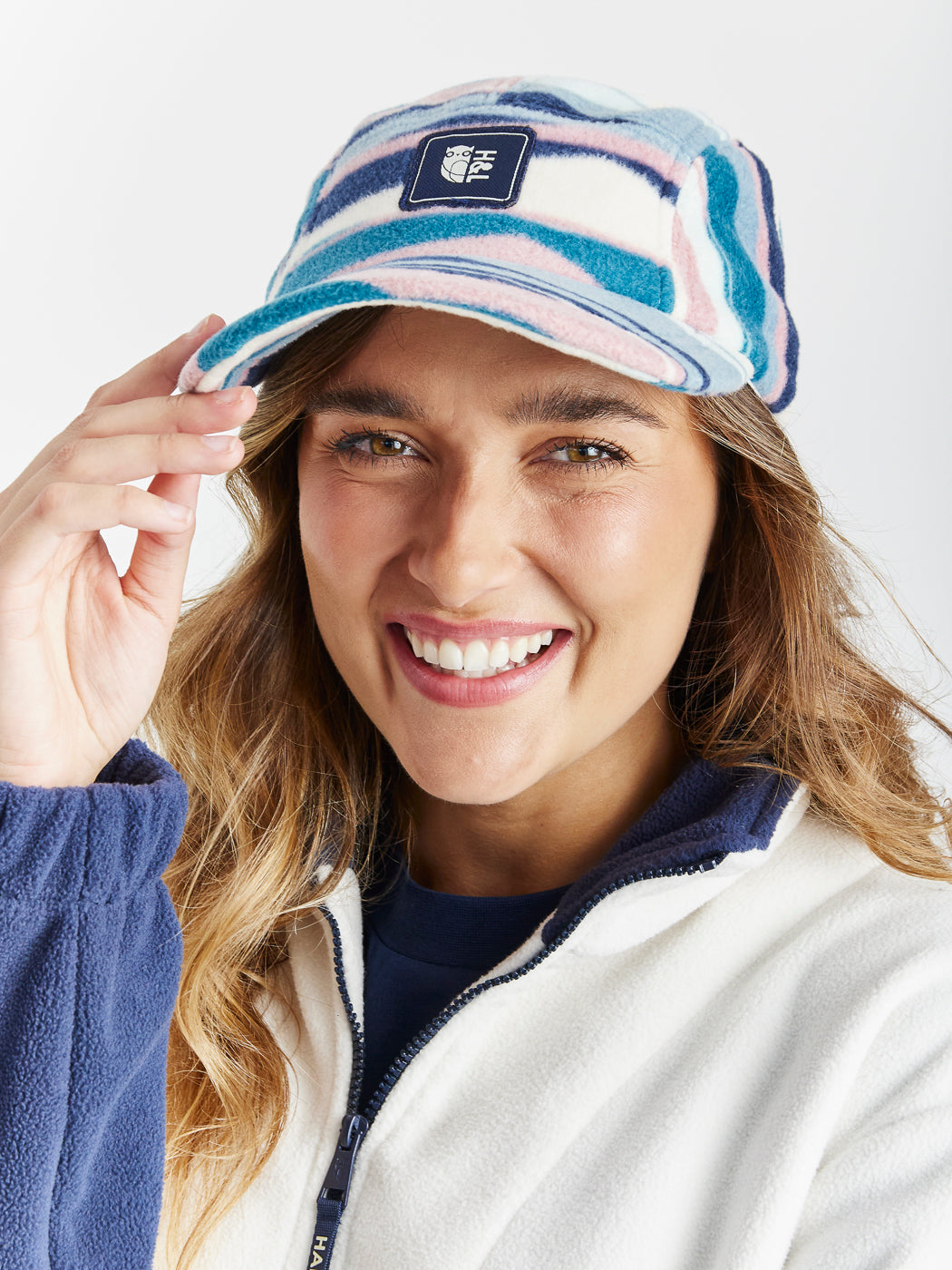 Made from 100% polyester, this cap offers both durability and comfort.