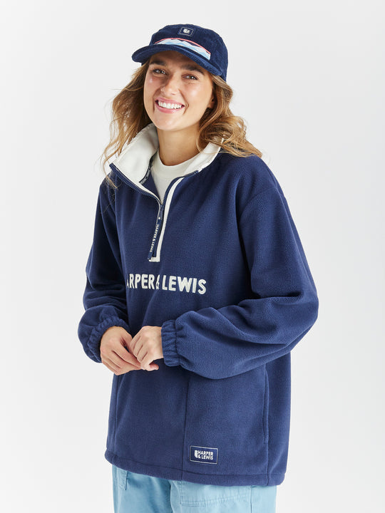 Oversized Quarter Zip Retro Fleece with two side pockets and a drawcord hem.
