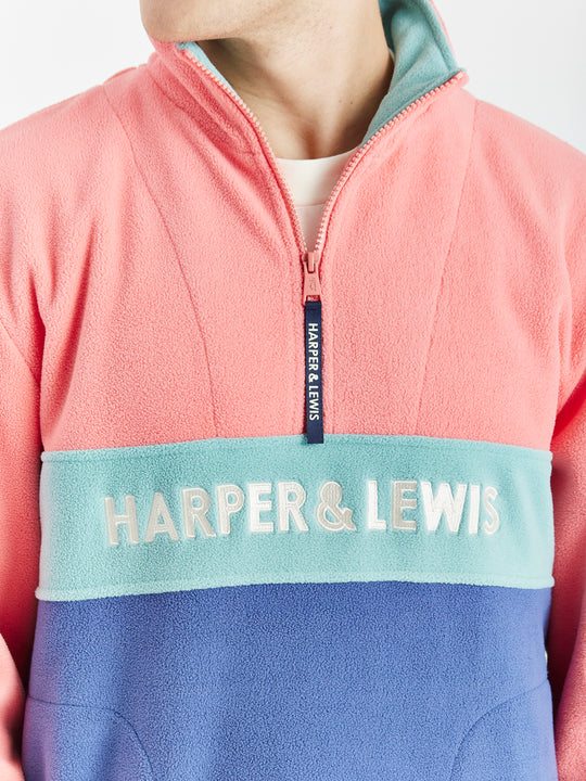 Quarter zip with Navy branded zip pull, with cream embroidered Harper & Lewis Logo, adding subtle details to warm fleece.
