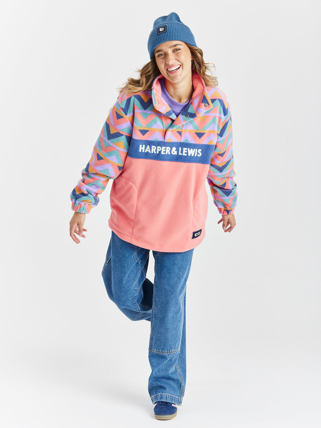 Polar Fleece, with a patterned top half, airforce blue middle and coral bottom half.