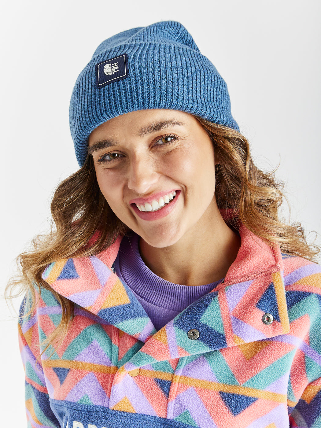 Stay warm and stylish with the Murren Beanie, a versatile woolly winter hat in a sleek Airforce Blue.