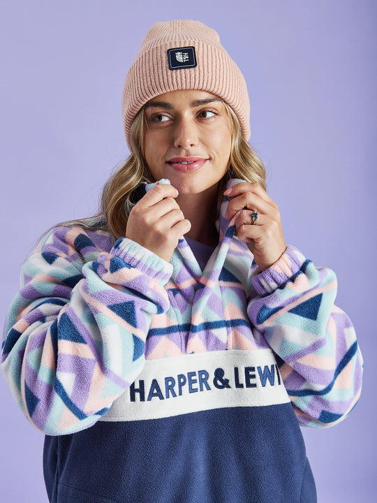 Comfort-fit Harper & Lewis Polar Fleece, with a relaxed silhouette, popper neck collar, and soft fleece texture. Embroidered chest logo adds a refined touch.