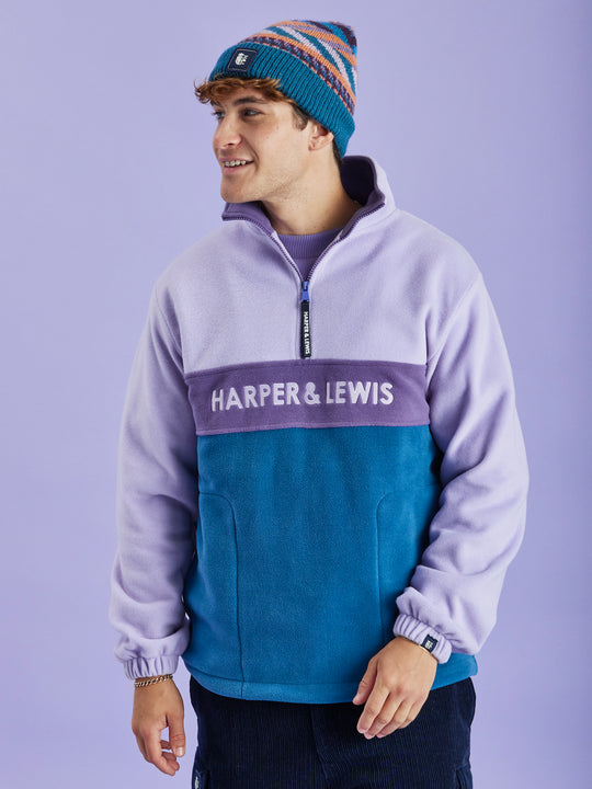 Harper & Lewis Mellow 1/4 Zip Fleece, features a Colour Block design with colours including Lavender, Purple and Petrol.
