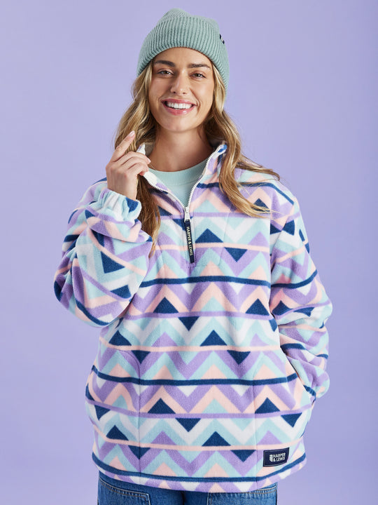 Oversized 1/4 Zip Retro Patterned Fleece with two side pockets, a drawcord hem and an all over print.
