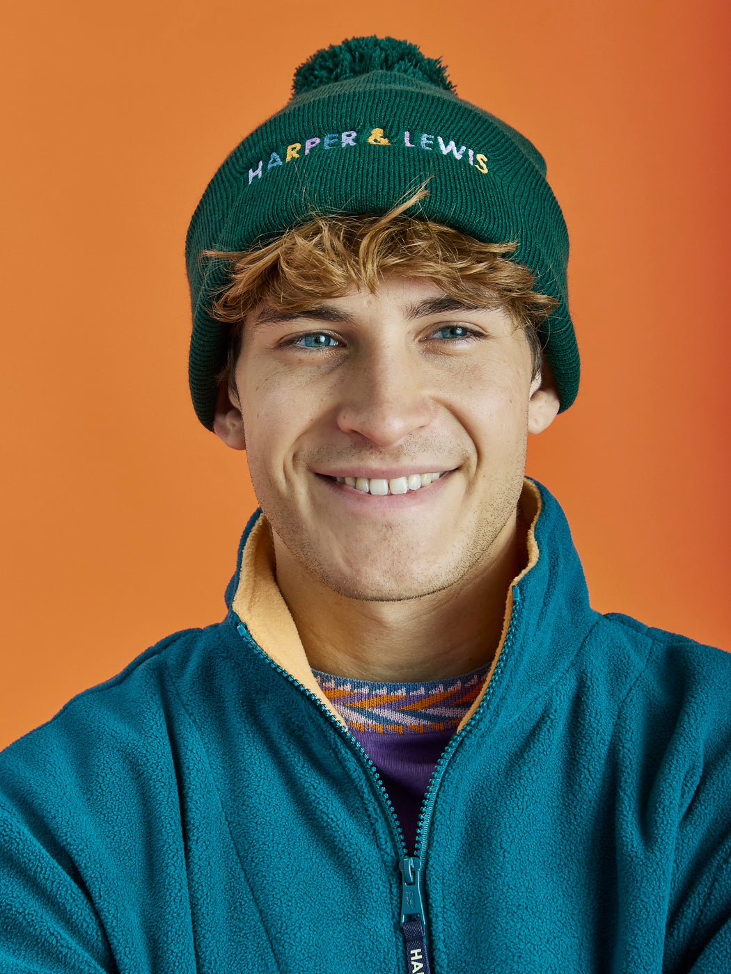 Stay warm and stylish with the Aubin Pom Pom Beanie, a versatile woolly winter hat in Bottle Green. 