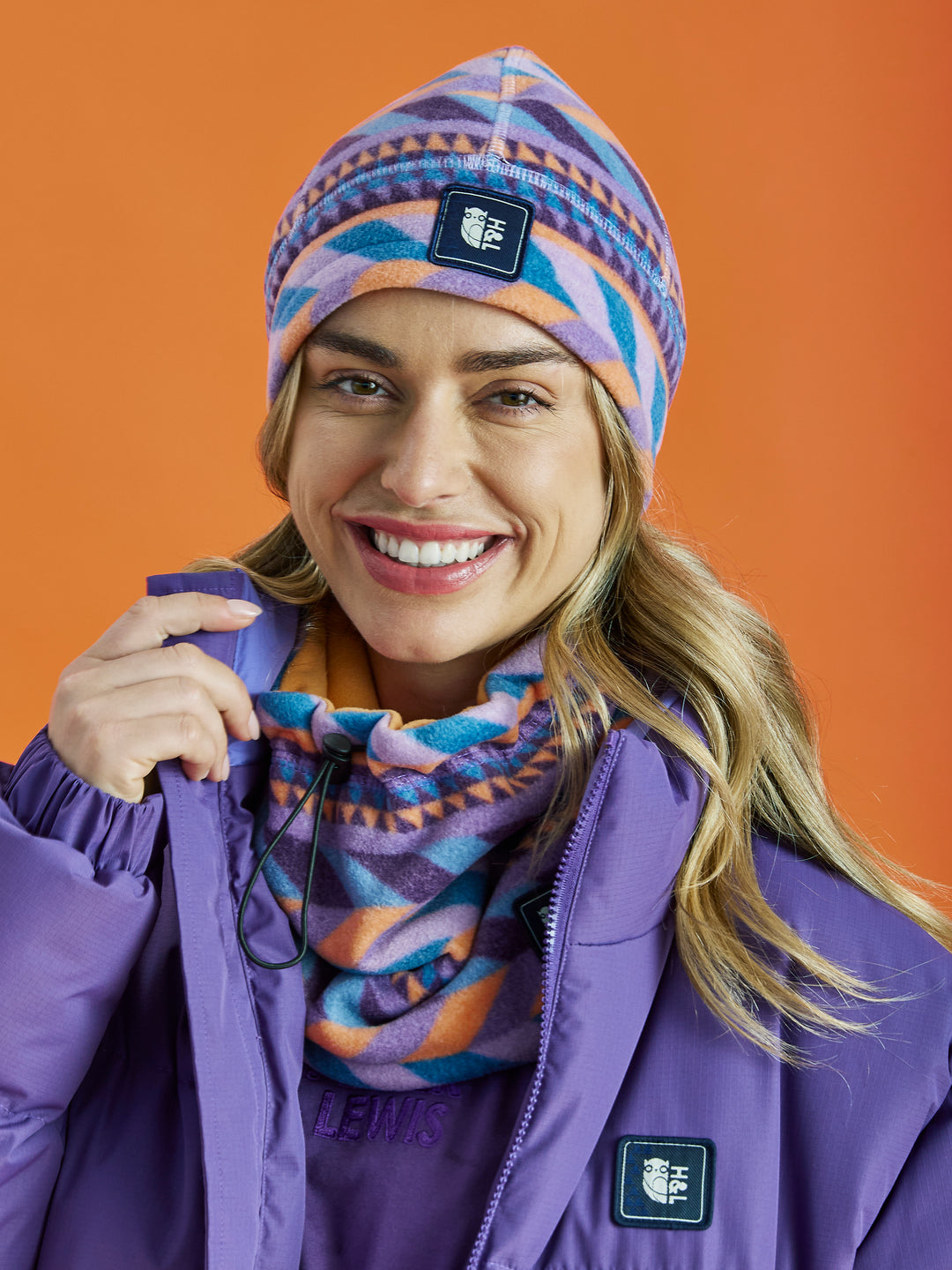 Stay warm and cosy with the Raine Retro Pattern Fleece Snood.