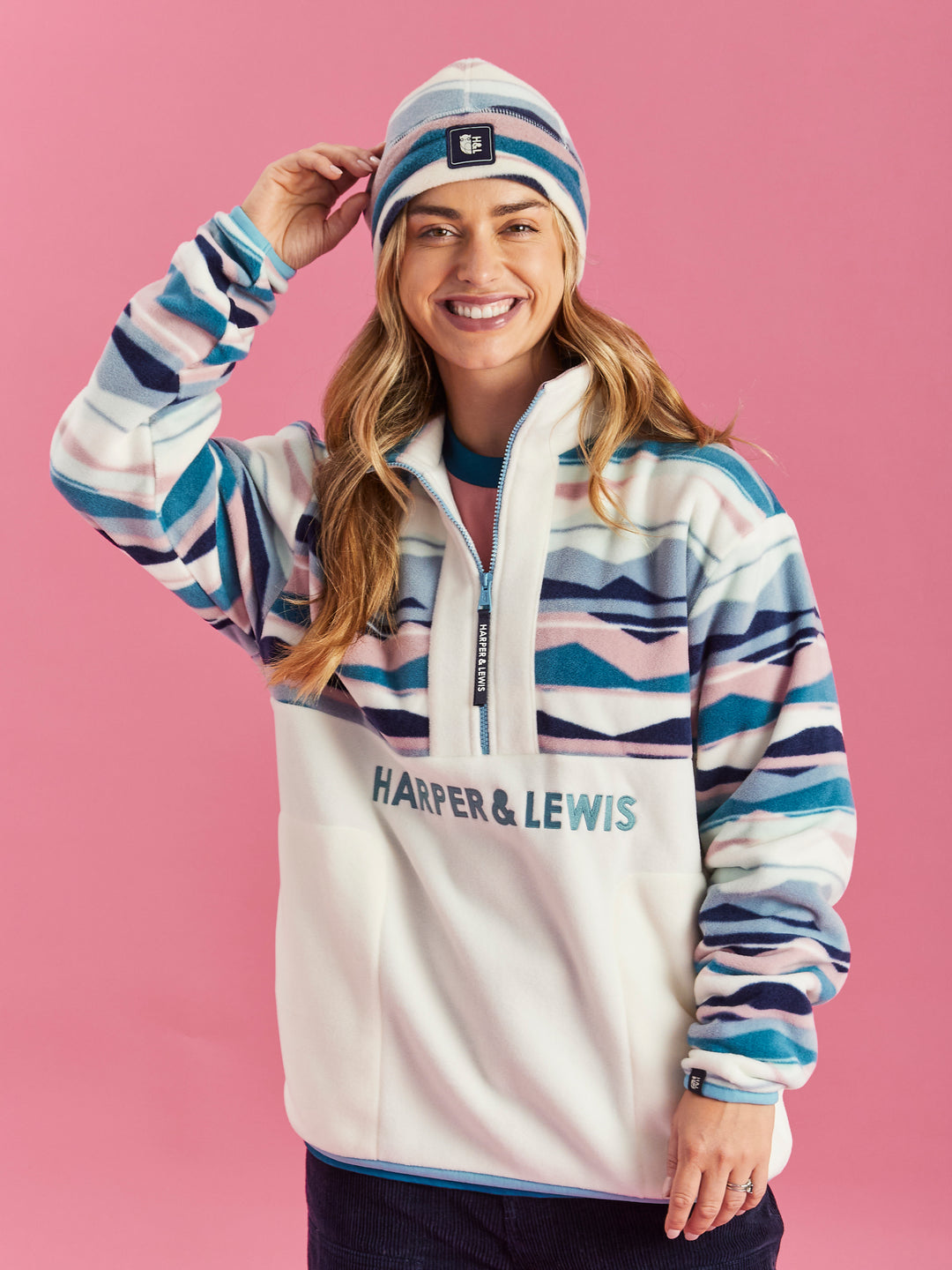 Patterned fleece styled with matching printed hat.