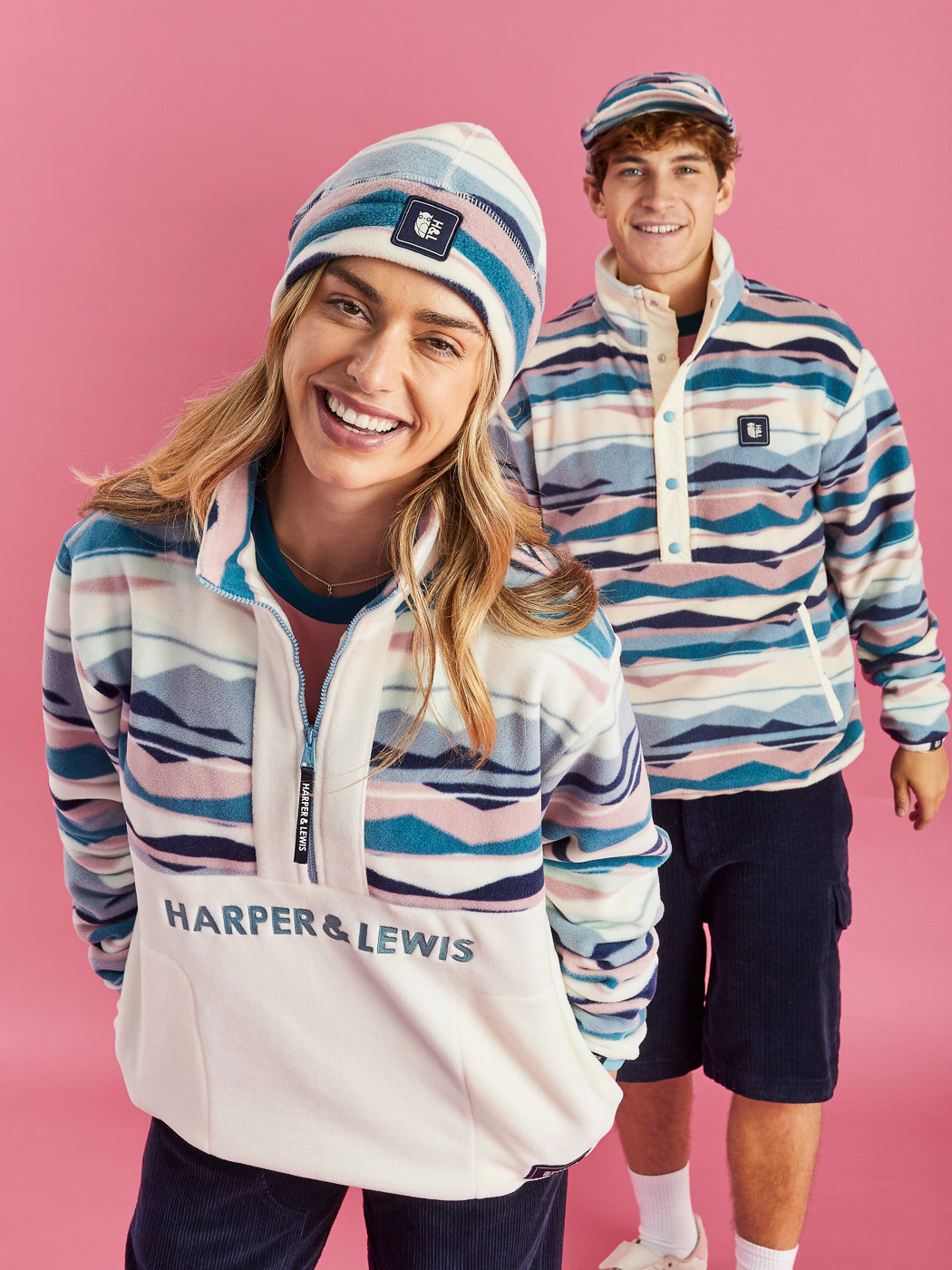 Unisex Quarter Zip Fleeces in a Mountain Patterned Print.