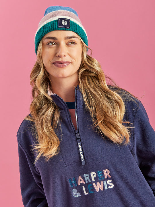 The Beanie features Teal Green, Steel Blue, Cream and Dusty Pink.