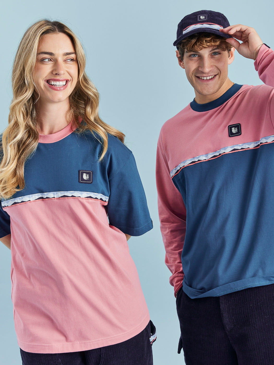 This crew neck t-shirt features a vibrant colour block design in Teal Green and Dusty Pink.