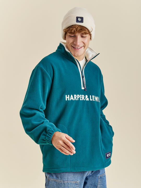 Harper & Lewis Ocean 1/4 Zip fleece in our classic Dark Green and subtle embroidery on the chest.