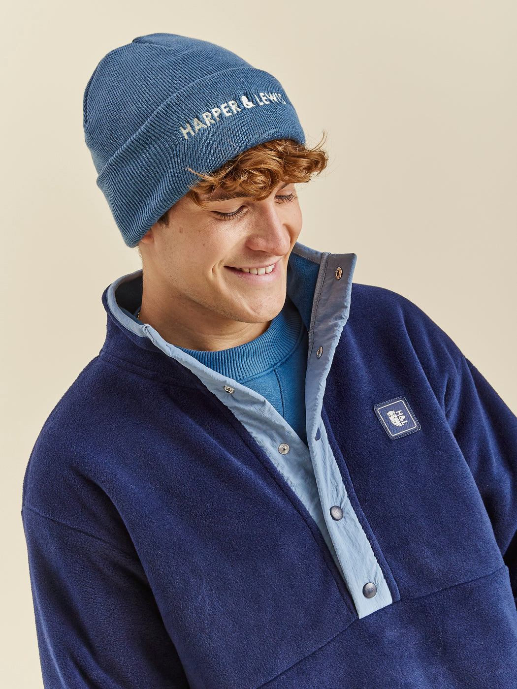 The beanie is finished with embroidered Harper & Lewis logo in Cream adding a subtle, modern touch to the classic design.