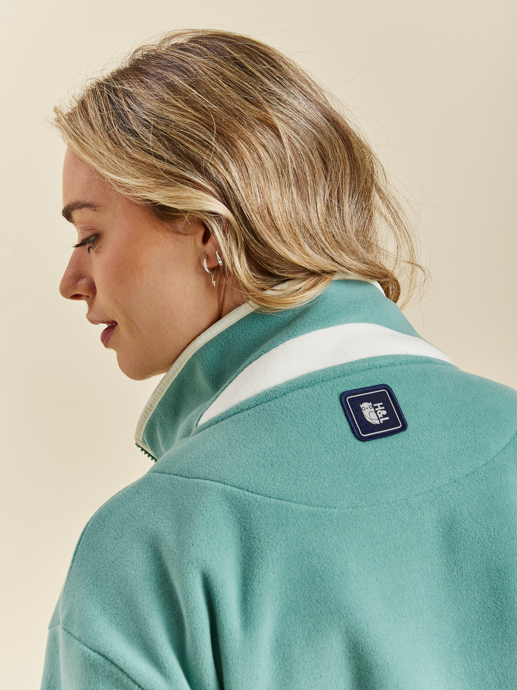 Men's fleece jacket in Petrol colour and a contrasting Cream inside collar.