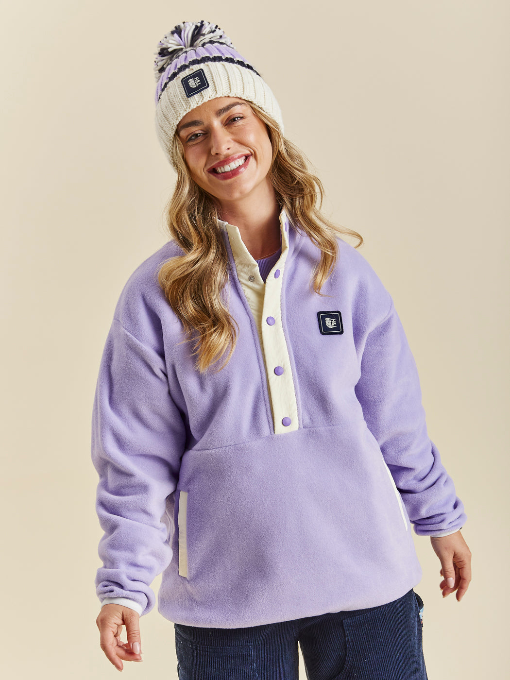 Inspired by a vintage fleece, this Lavender fleece with cream details is a must-have item for your wardrobe. 