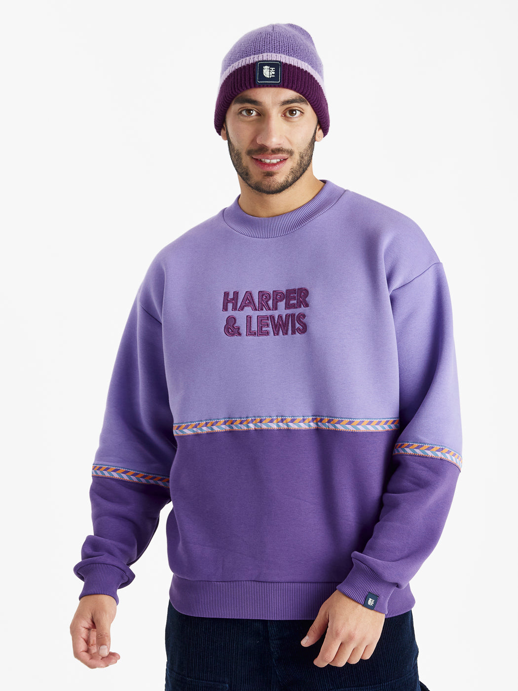 Patterned woven tape on the chest and arms, offering both stylish and comfortable sweatshirt.