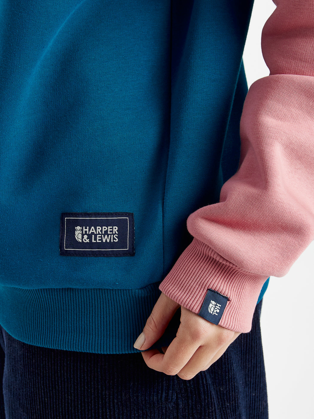 Branded Harper & Lewis tabs on the hem and the cuff of the unisex sweatshirt.