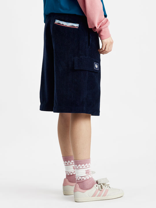 The Cord Jorts feature a back pocket with our classic mountain tape detailing.