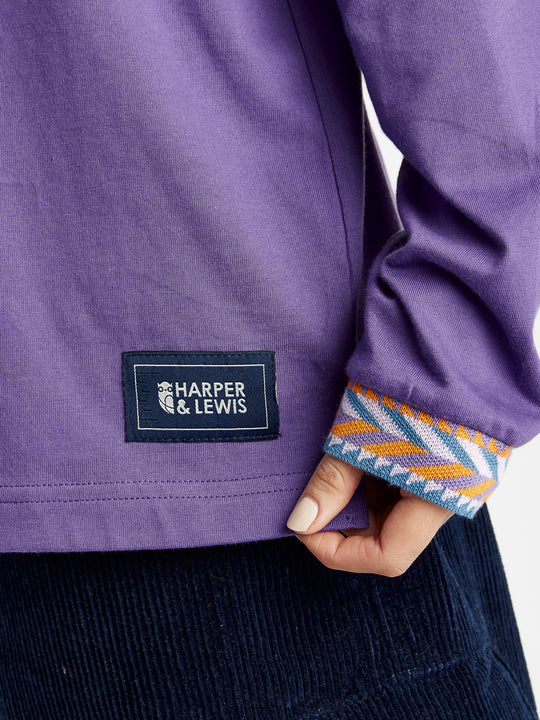 Woven navy Harper & Lewis tab on the hem of this long sleeved t-shirt.