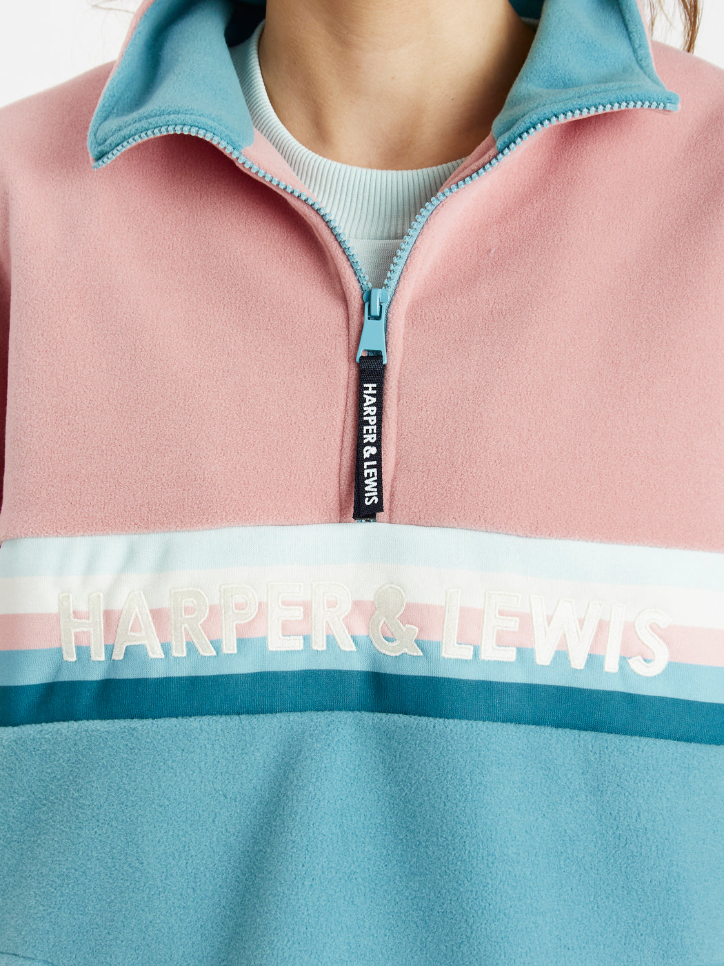 Quarter Zip Polar Fleece featuring a striped chest panel with colours of Cool Aqua, Cream, Dusty Pink, Teal, and Steel Blue
