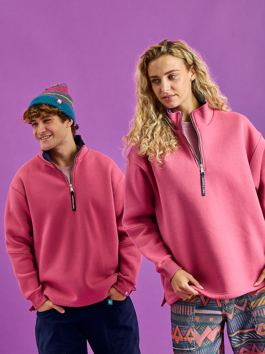 Both Models wear the Fable quarter zip sweatshirt with set-in sleeves.