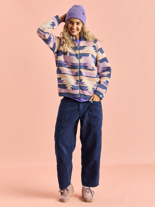 Female Model wears the Knitted Cardigan which offers a slouchy fit, perfect for those who love a relaxed and comfortable style.