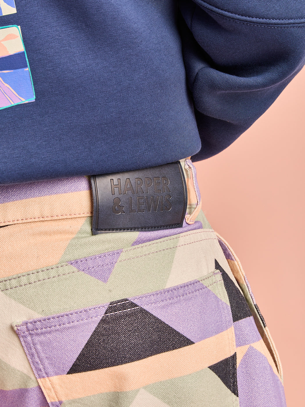 Detail shot of the Harper & Lewis navy patch on the waistband