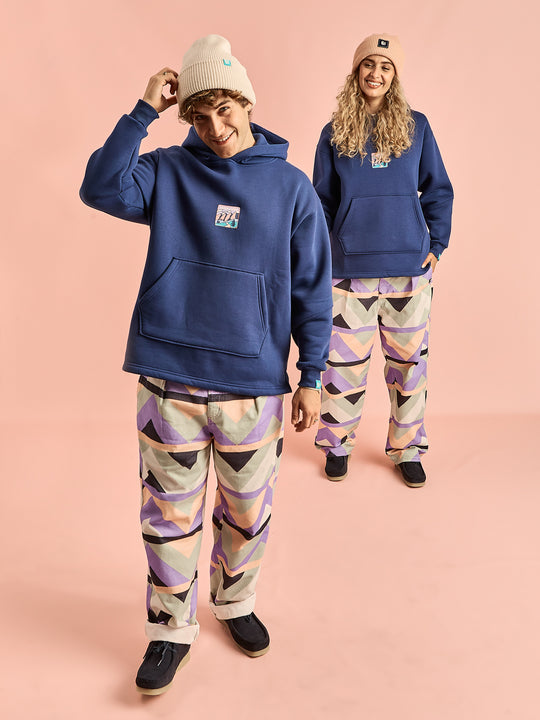 Both models wearing the Ezra patterned trousers made from 100% Cotton Twill