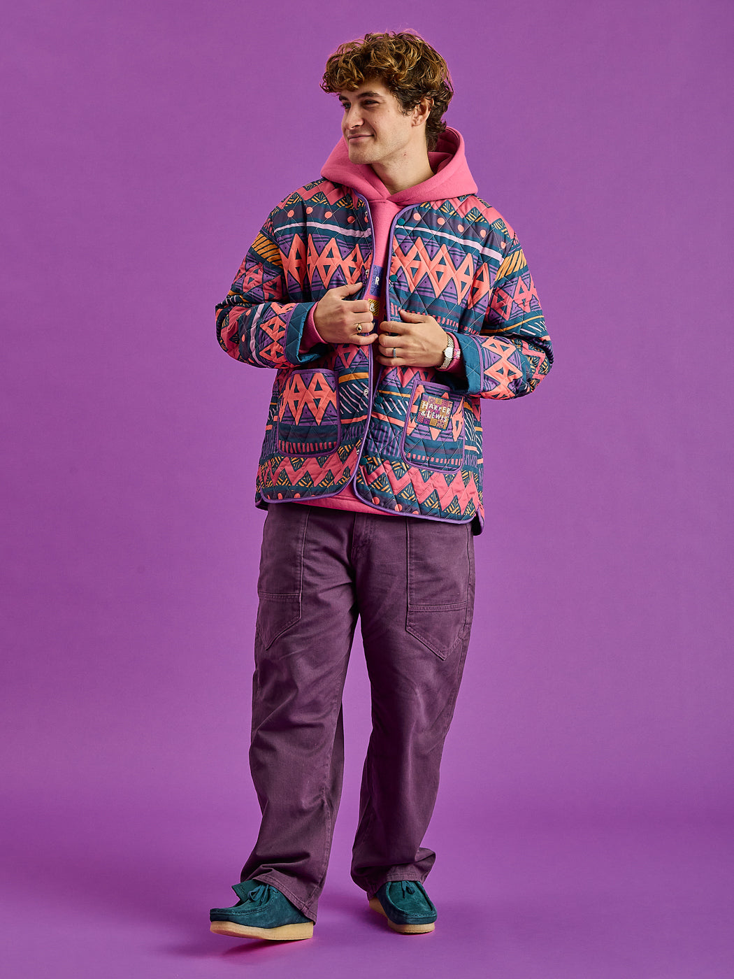 Male Model showing the Zinnia Jacket which has a slightly oversized fit to be used in layering.