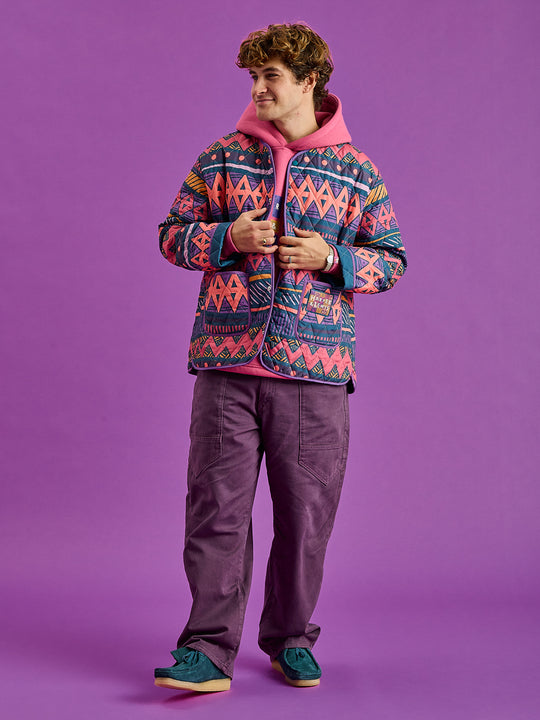 Male Model showing the Zinnia Jacket which has a slightly oversized fit to be used in layering.