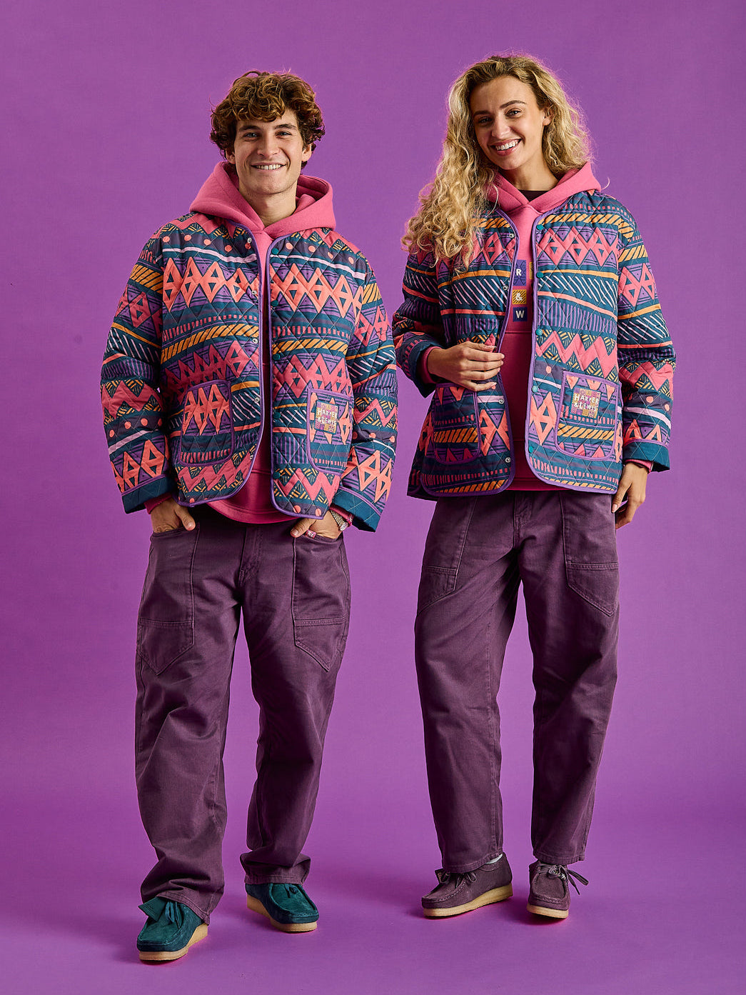 Both models wearing the go-to layer for autumn days.