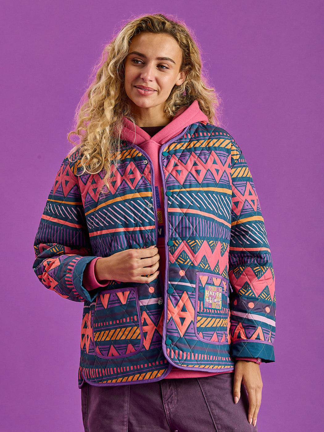 This Lightweight jacket features functional front pockets and is quilted for added warmth and texture.