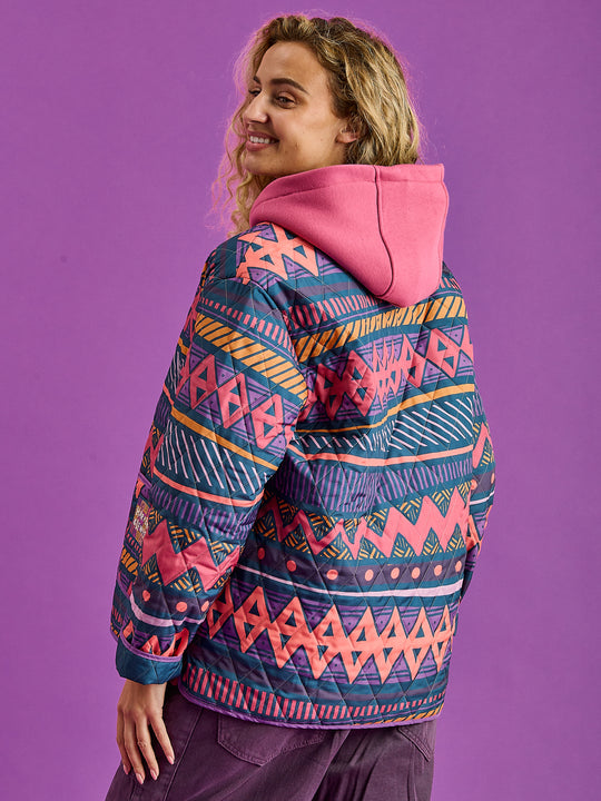 Back shot of the Zinnia Quilted Jacket shown wearing a hoodie.