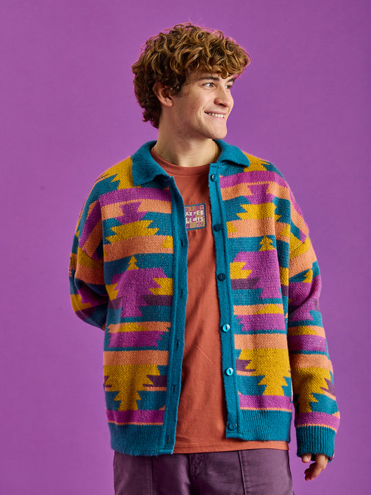 Male Model wears the Colby Cardigan in the Aztec wave pattern.