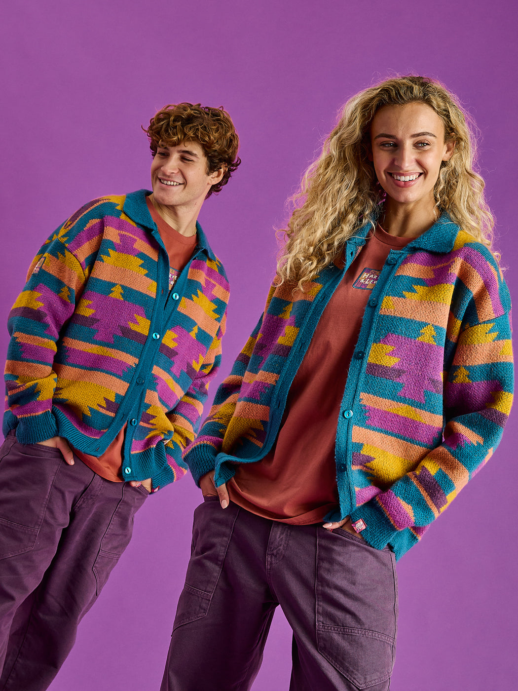 Both Models wearing the Colby knitted cardigan, made from 75% Acrylic, 25% Nylon.
