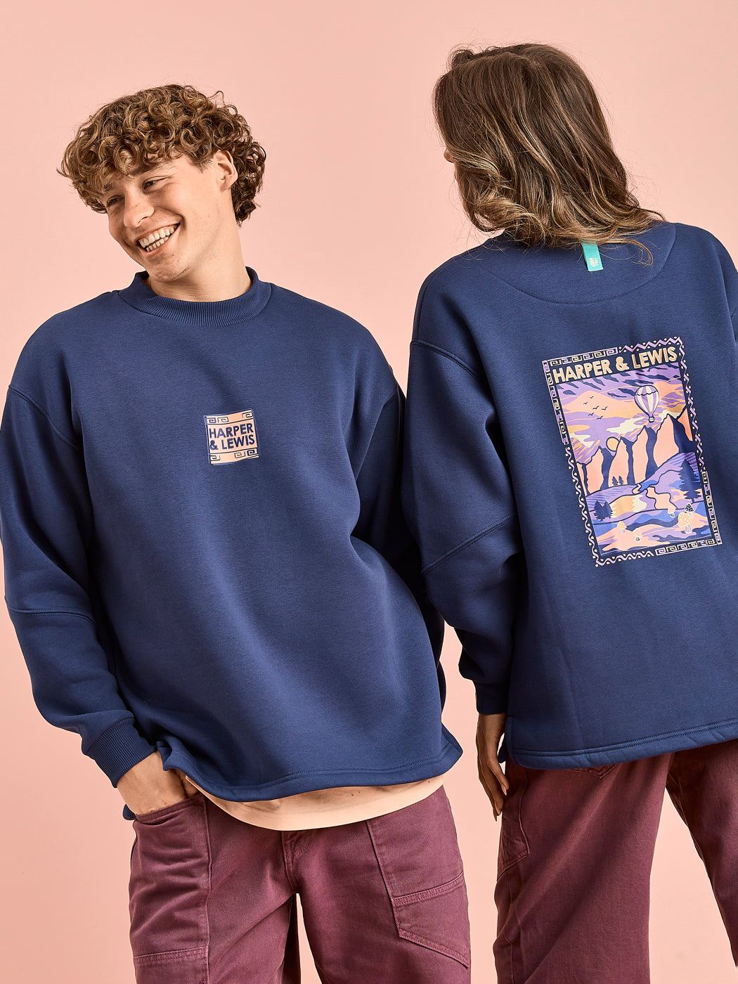 Both Models wear the Atlas Sweater in Navy.