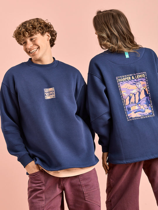 Both Models wear the Atlas Sweater in Navy.
