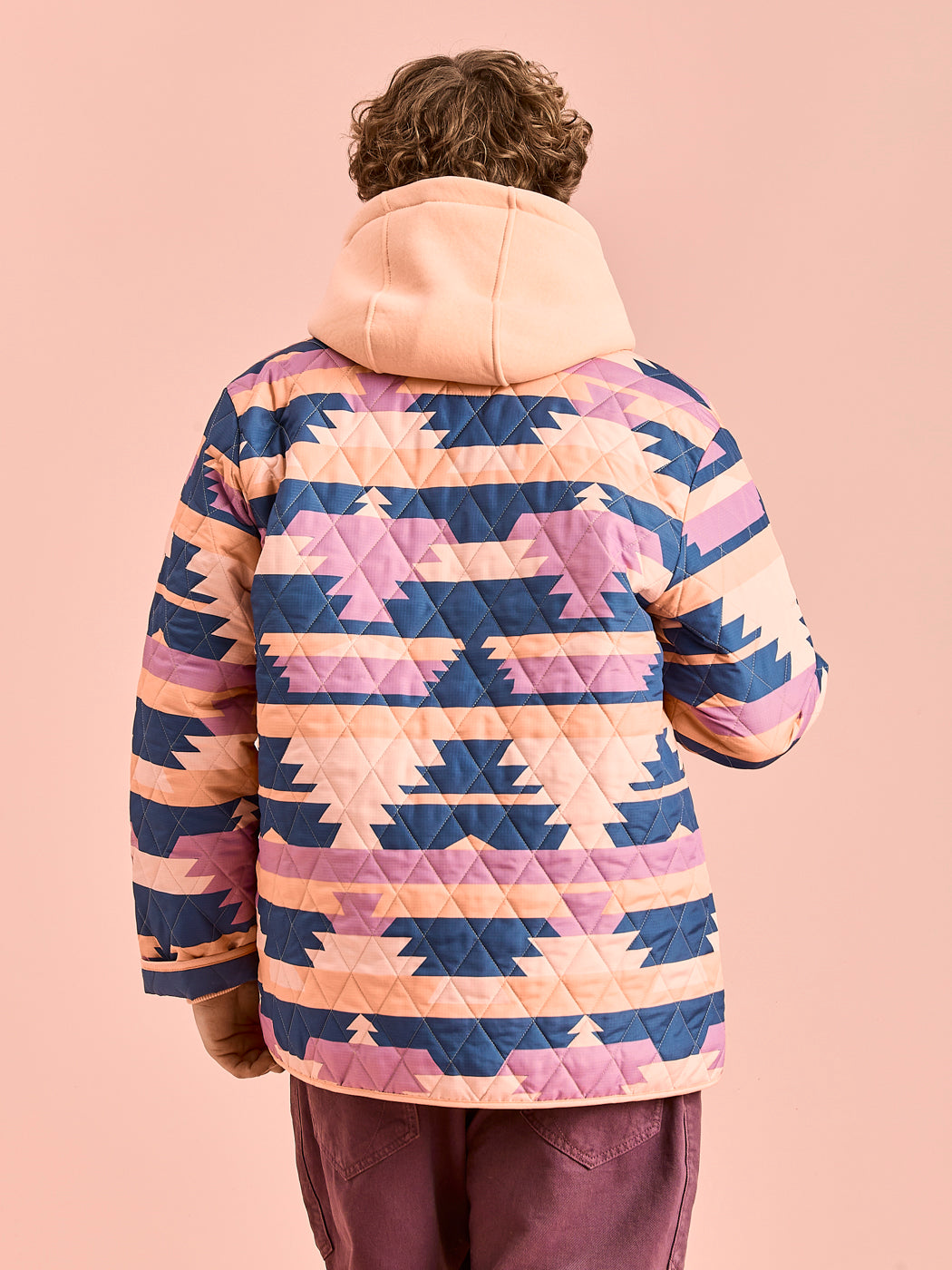Back shot of the quilted jacket with Relaxed oversized fit for easy layering