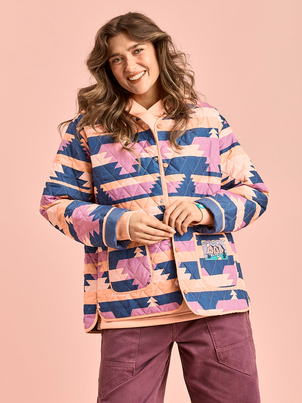 This unisex jacket is quilted for extra warmth, this piece brings both comfort and standout style.